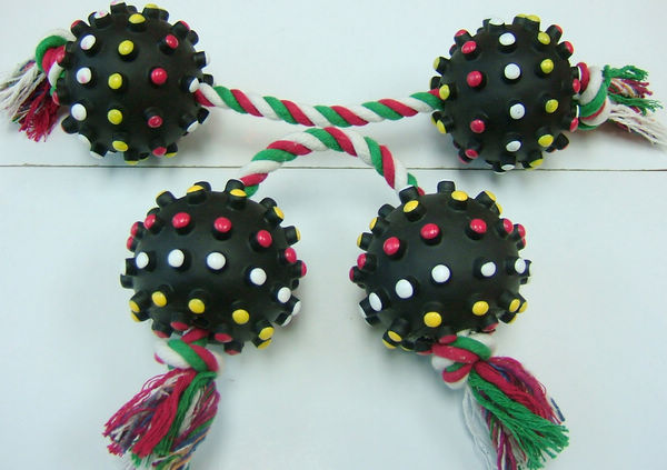 black spikey ball with rope
